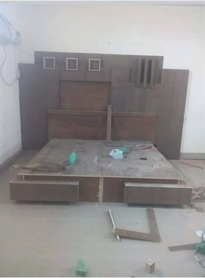 Bed platform with panelled headboard