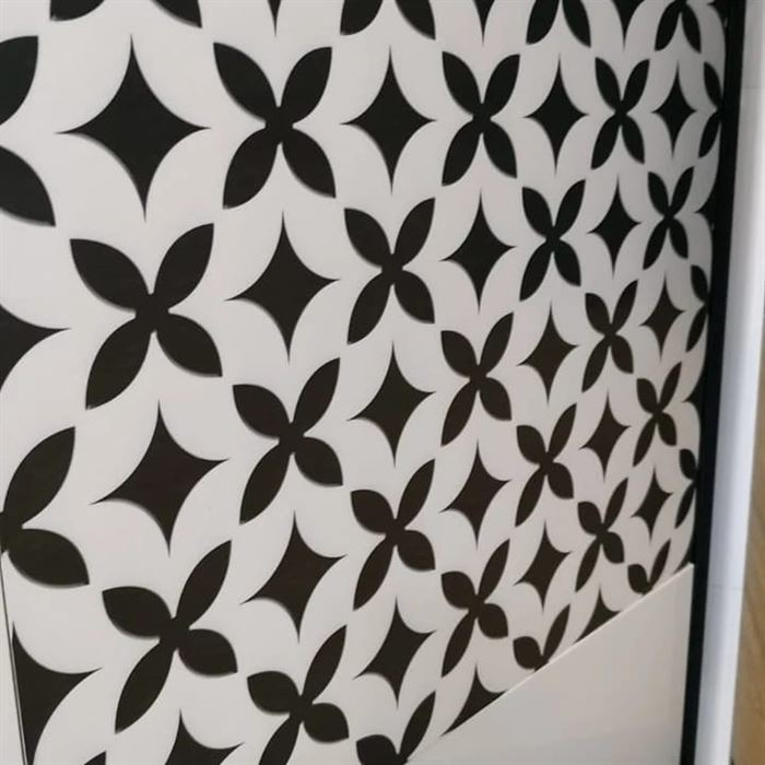 Black and white geometric decorative panel