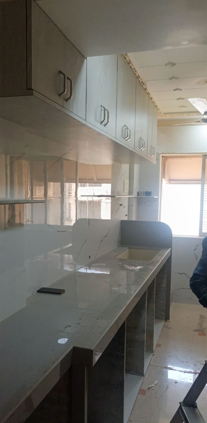 Long pantry counter with overhead storage