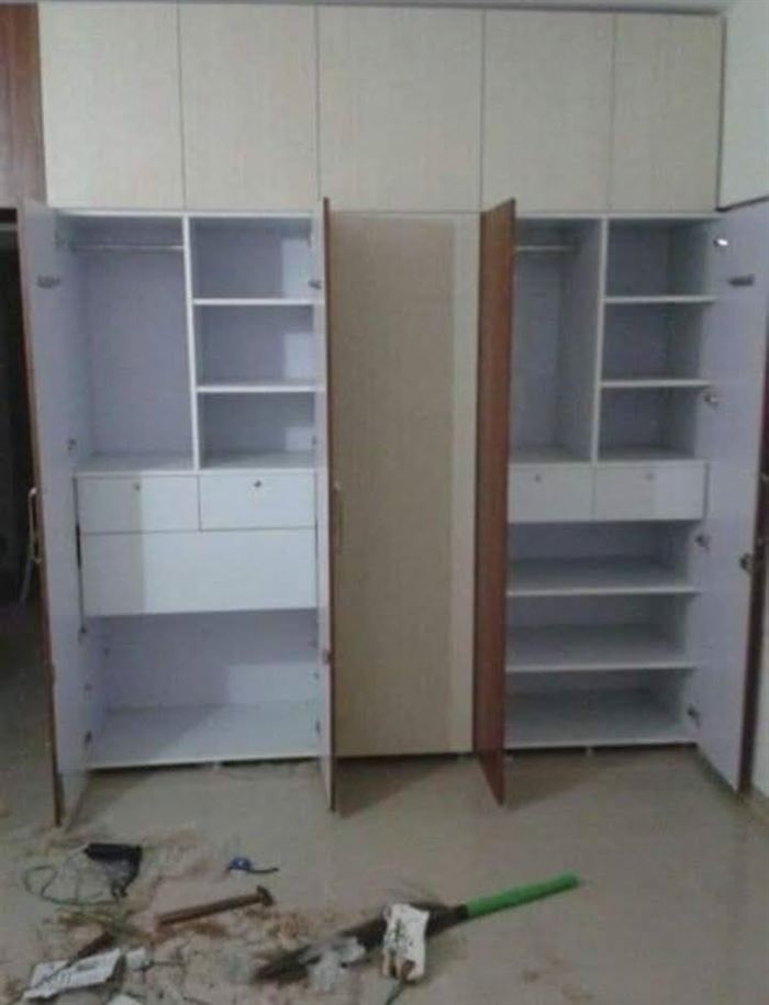 Open wardrobe showing shelving and hanging space