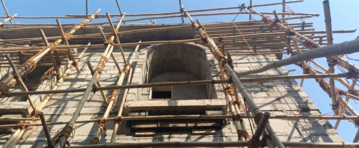 Structure under construction with scaffolding
